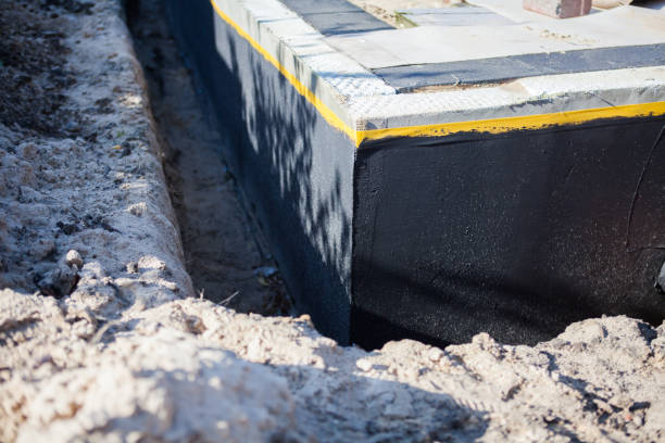 Professional Exterior Waterproofing technician working in Mount Morris, MI